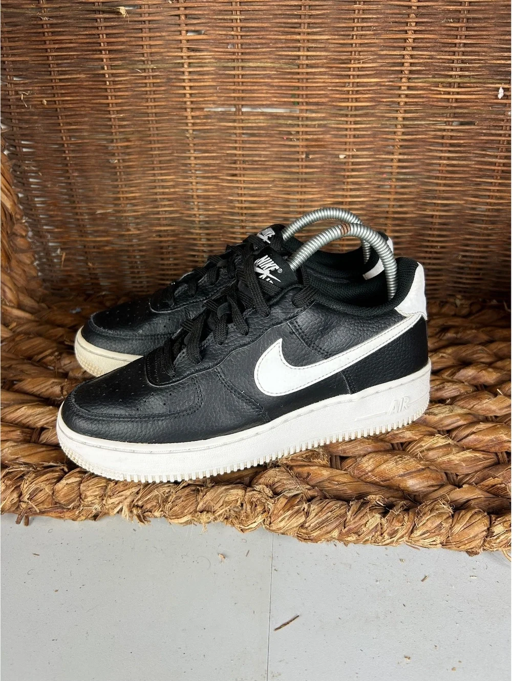 Nike Air Force 1 black and white low sneakers